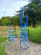 BLUE LIFT 1 & 2  2018   230 x 35 x 35cm &  160 x 35 x 35cm respectively  Steel primed & painted, tinted perspex & fixings, raised on rods and cement base  Exhibited at Goodnestone Park, Kent 2022