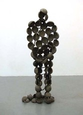 BOUNTY MAN  2006-07   175 x 60cm   Cast cement fondue taken from moulds of breadfruit & adhesive