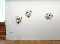 Skirting board wall works MASK, ENWRAP & SPACE INVADER, shown in 'Teeth Stronger Than Diamond' exhibition 2018, The Courthouse Gallery, Ennistymon, Co Clare, Ireland